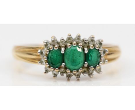 A 9ct gold chrysoprase and diamond halo trilogy dress ring, Q 1/2, 2.9g 