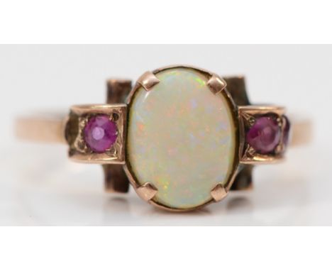 A 9ct gold opal and ruby dress ring, missing stones, M, 2.5g 