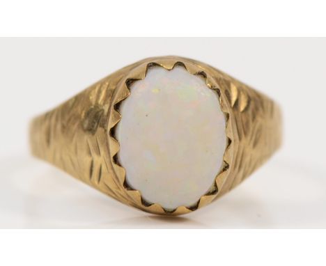 A 9ct gold bezel set opal single stone ring, N, 2g 