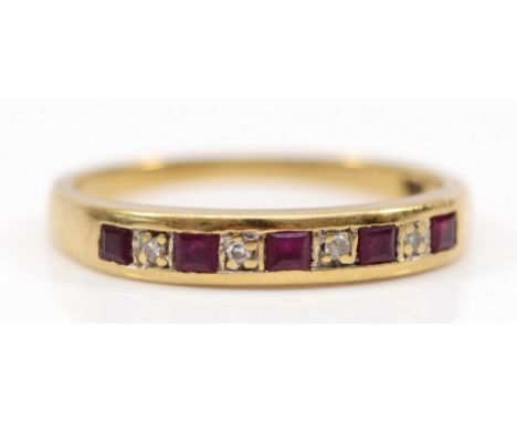 A 9ct gold square cut ruby and diamond half eternity ring, channel set, K, 1.3g 