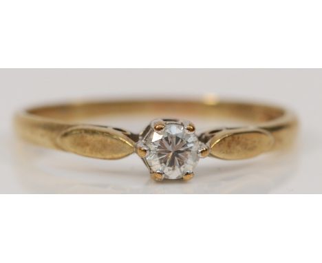 A 9ct gold brilliant cut diamond single stone ring, stated weight 1/8ct, K, 1gm 