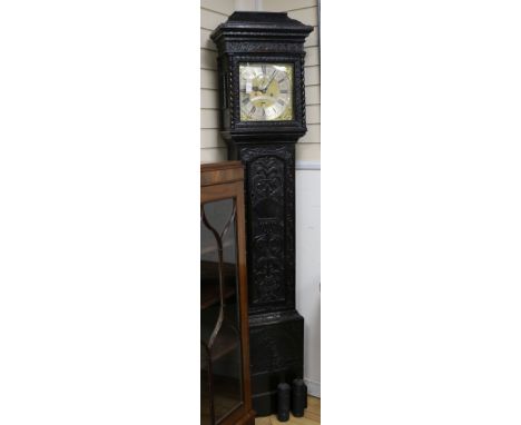Thomas Pierce of Bristol. A George III eight day longcase clock, in a carved oak case bearing the date 1735
