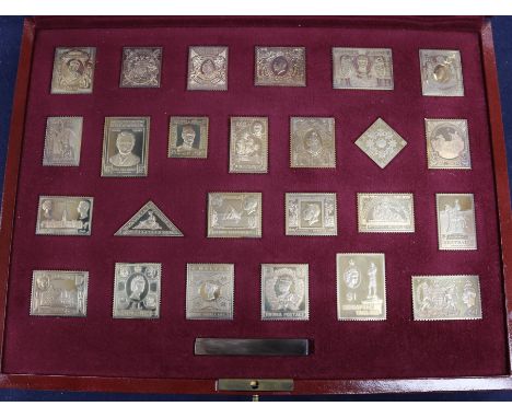 A cased set of twenty four silver gilt stamp replicas, 'The Empire Collection', London 1981.