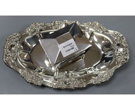 An Edwardian sarcophagus shaped silver tea caddy, William Hutton &amp; Sons, Birmingham, 1907 and a plated dish.