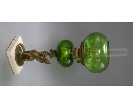 An early 20th century Egyptian revival cast brass oil lamp