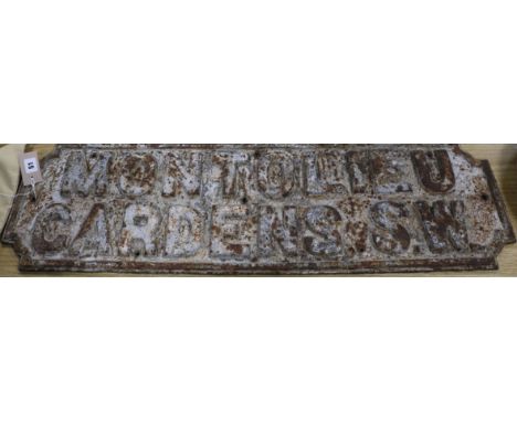 A vintage 'Montolieu Gardens SW' cast iron road sign length 94cm