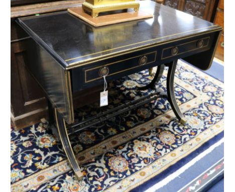 A Regency style ebonised and parcel gilt sofa table, W.95cm