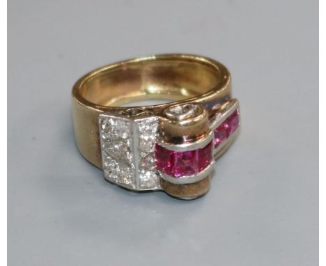 A 1950's? yellow metal, ruby and diamond cluster cocktail ring, size K.