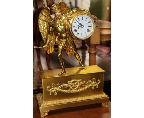 A gilt brass 'Father Time' mantel clock height 44cm