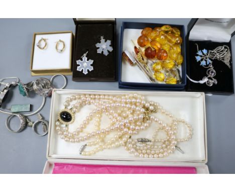 A 9ct gold signet ring, a pair of 9ct gold earrings, a yellow metal and seed pearl starburst brooch and sundry jewellery, inc