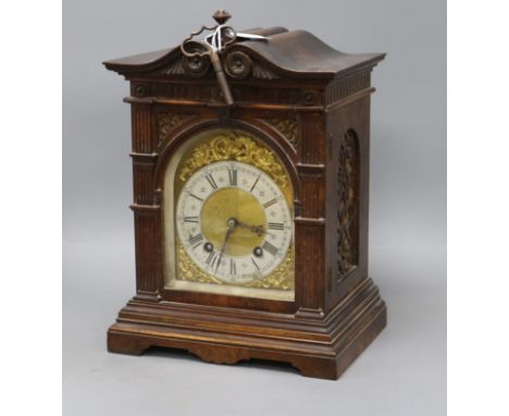 A German mahogany and walnut mantel clock height 35cm