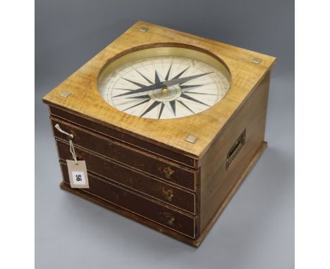A mahogany games compendium with compass top