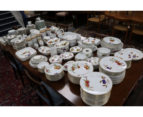A very extensive Royal Worcester Evesham oven proof service of fruit decorated ware and tureens and other items