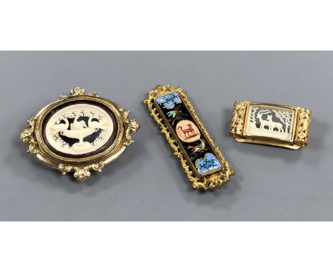 A Victorian pinchbeck 'Pliny Doves' swivelling brooch and two other gilt metal brooches including enamel.