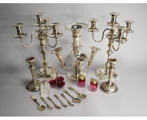 A collection of silver plated wares, to include; a pair of three branch candelabra, 39cm high, an epergne, a pair of candlest