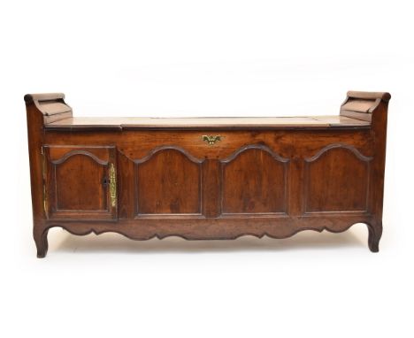 A 19th century and later fruitwood bench, with a hinged seat and canted hinged sides, opening to reveal compartments, above t