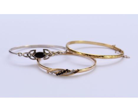 A 9ct gold sapphire and diamond set hinged bangle, together with a further 9ct gold bangle, total weight approx 12.4g, togeth