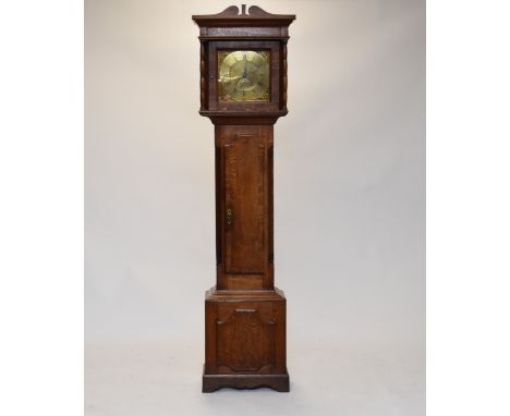 A George III oak brass dial longcase clock, James Webster of Shropshire, the hood with scroll pediment and turned full column