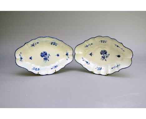 A pair of Caughley 'Carnation' dessert centre dishes, circa 1785-92, of canted oval form with ozier-moulded borders and paint