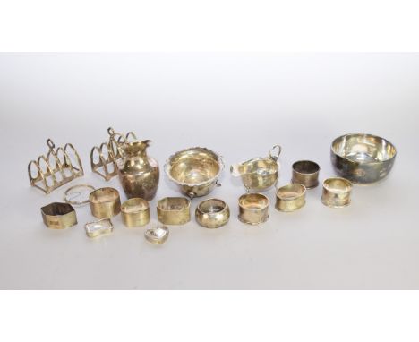 A collection of silver, comprising; a pair of four division toast racks, Emile Viner, Sheffield, two bowls (one at fault), a 