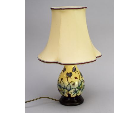 A Moorcroft baluster table lamp in the 'Hepatica' pattern, complete with original shade, height excluding fitting 22cm high