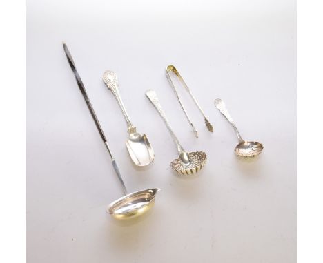 A small collection of silver, comprising; a stilton scoop, Sheffield 1908, a pair of Russian silver sugar tongs, two sugar si