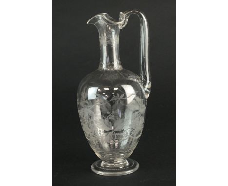 A good quality English glass decanter, probably Stourbridge late 19th century of single-handled form, engraved to the body wi