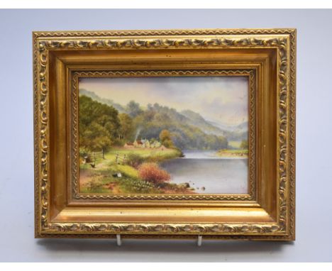 A Royal Worcester rectangular plaque circa mid to third quarter of the 20th century painted by P. Platt with a view of cottag