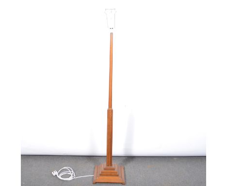 Oak standard lamp, square tapering column, stepped base, with shade, height 185cm.