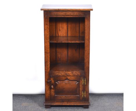 Titchmarsh &amp; Goodwin oak bookcase, rectangular top, open shelf above a cupboard, width 47cm, depth 26cm, height 97cm.