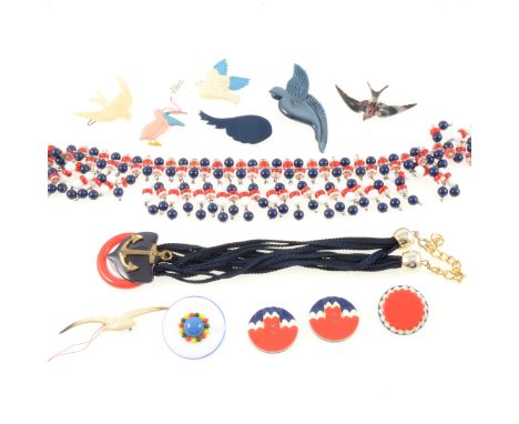 A red, white and blue bead fringe necklace, 5cm drop, 39cm length; a nautical necklace with multiple navy blue laces ending i