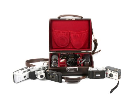 Vintage film cameras and accessories, including Yashica FR1 with two lenses and flash, cased; Agfa Isola I, cased; three othe