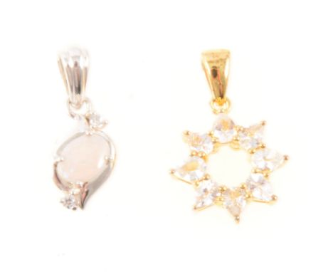 Gemporia - A white sapphire Midas pendant, the eight pear cut white sapphires 4mm x 3mm claw set in a star shape, total 1.300