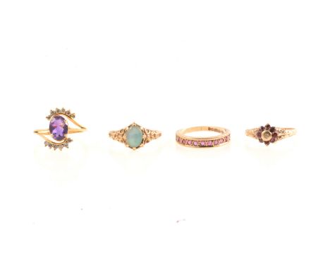 Four gemset dress rings, a 9 carat yellow gold half eternity line edge set with eleven rubies, Birmingham 1979, ring size N, 
