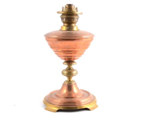 Victorian brass and copper oil lamp, in the manner of Benson, height 35cm.