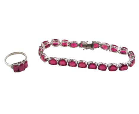 A ruby tennis bracelet, set with twenty one oval cut rubies, on a snap clasp, white metal stamped 925, together with a ruby t