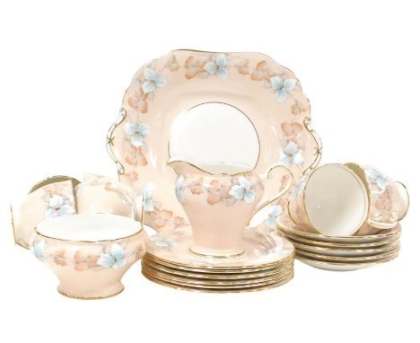 An Aynsley porcelain Trillium pattern porcelain part tea service, comprising bread plate, cream jug, sugar bowl, six teacups,
