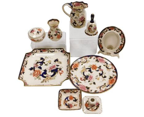 A group of Masons ironstone Blue Mandalay pattern wares, including plates and dishes, an oval photograph frame, hydra jugs, b