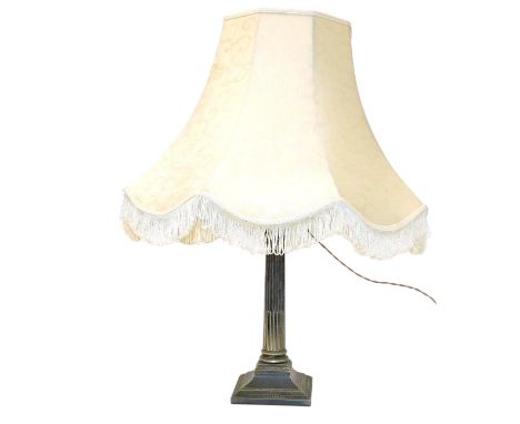 An Edwardian silver plated Corinthian column table lamp, with shade, 70cm high.Buyer Note: WARNING! This lot contains unteste