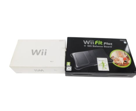 A Nintendo Wii console, together with a Wii Fit Plus balance board, both boxed.