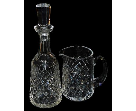 A Waterford Llama pattern cut glass decanter and stopper, 32cm high, together with a water jug, 16cm high. (2)