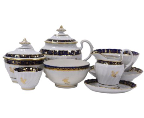 A late 18thC Barr Worcester porcelain part tea service, gilt decorated with thistles, and bands of repeating leaves and scrol