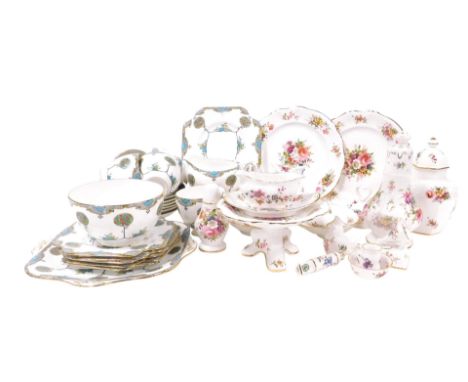 A group of Hammersley porcelain tablewares and ornaments, decorated with flowers, including a sugar sifter, pedestal sweetmea