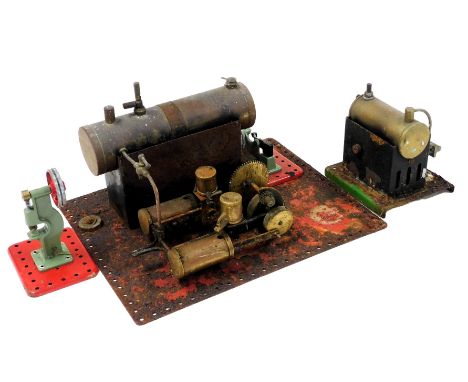 A Bowman model steam engine, further tin plate steam engine, Mamod model power press, and a steam hammer. (4)
