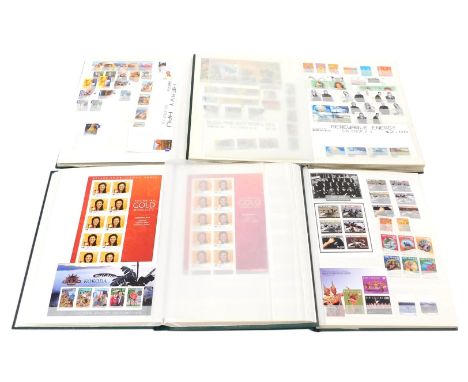 Philately postage stamps. Australia and New Zealand mint commemoratives in four albums.
