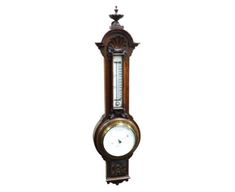 A late 19thC Negretti &amp; Zambra oak cased barometer, with thermometer, no. 12876, 65cm high.