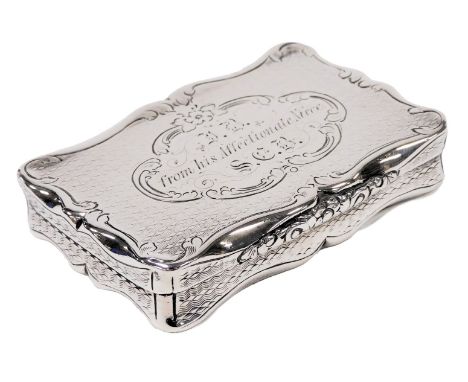 A Victorian silver snuff box, with engine turned decoration, rococo scroll and floral engraved reserve, presentation engraved
