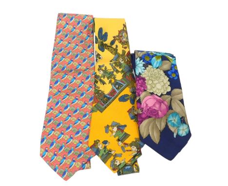 An Hermes yellow Aztec pattern silk tie, Nazareno Gabrielli pink silk tie, decorated with repeating pattern of puffins, and a