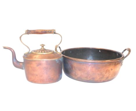 A Victorian copper jam pan, 37.5cm wide, together with a copper and brass kettle.  (2)