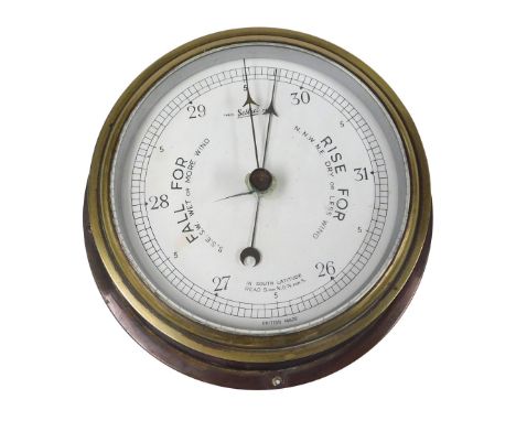A Sestrel brass cased barometer, 20cm wide.